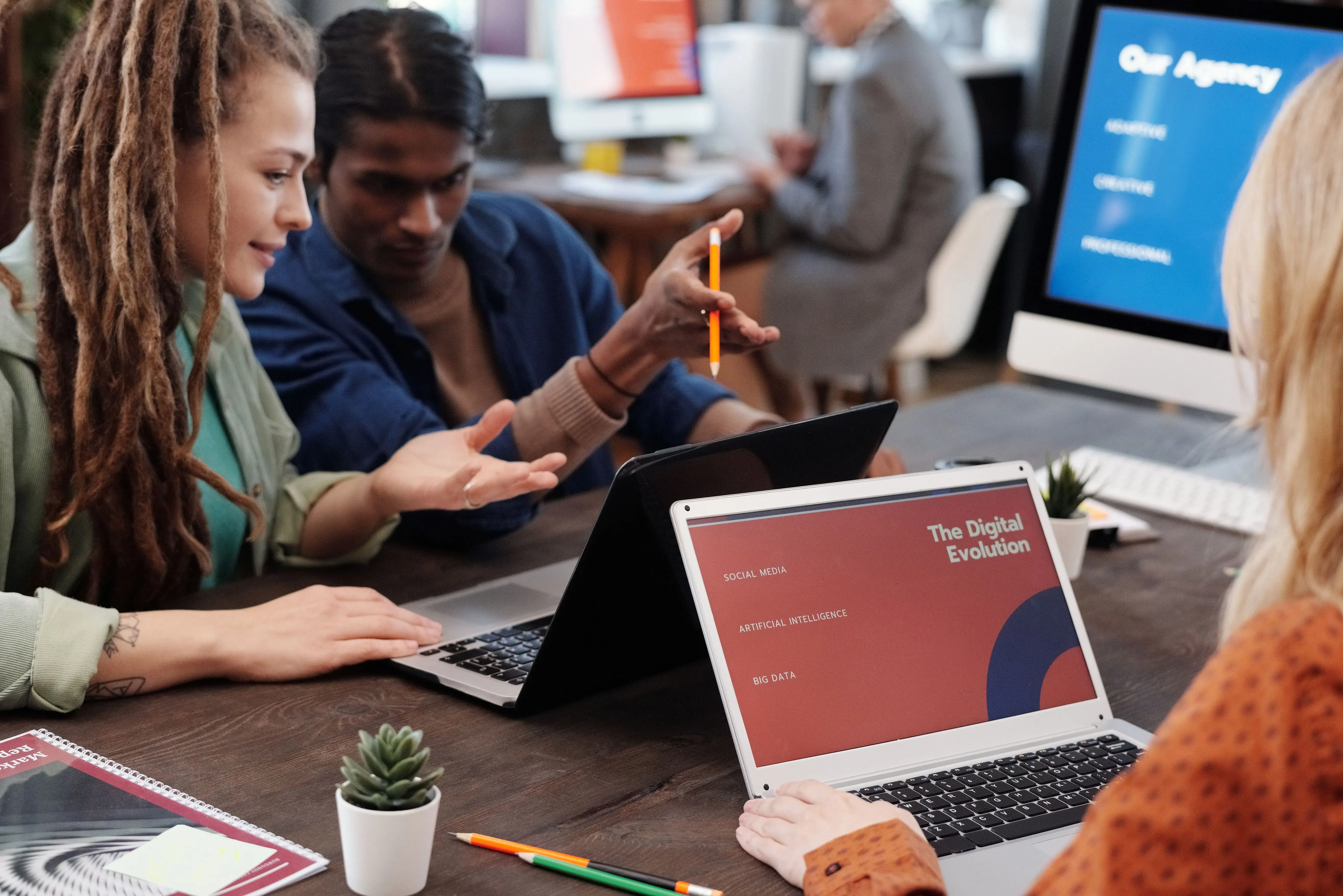 Professional team collaborating with digital tools